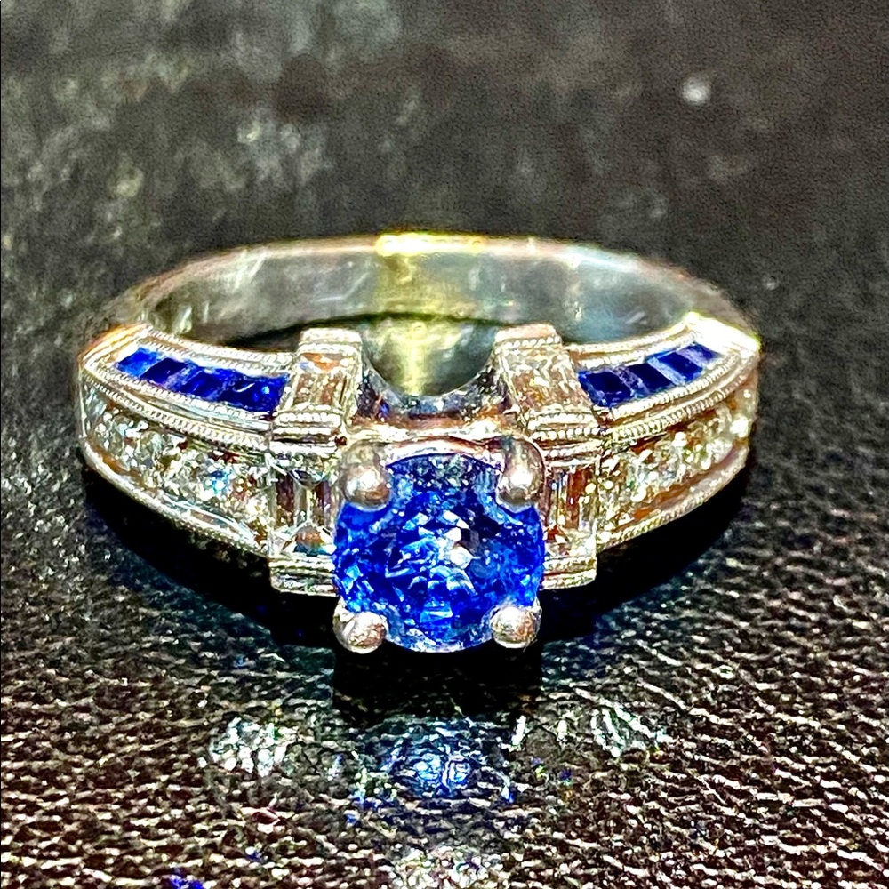 18K white gold ring accented with diamond and sapphire